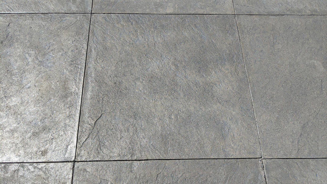 Hand-poured concrete squares stained Silver Gray Antiquing to look like slate