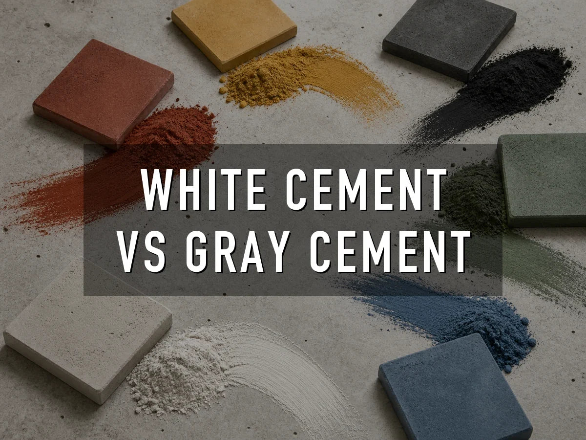 Red, yellow, black, green, white and blue concrete pigment powders swept across a concrete surface beside pavers cast in the matching colors, titled “White Cement vs Gray Cement”