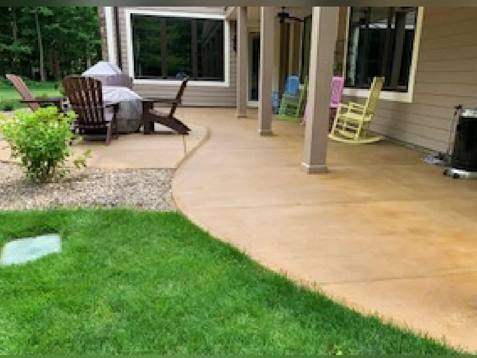 Tweed Antiquing Stain used to even out two different concrete slab colors placed over two years. Ssealed with Solvent-based, Satin Acrylic Sealer