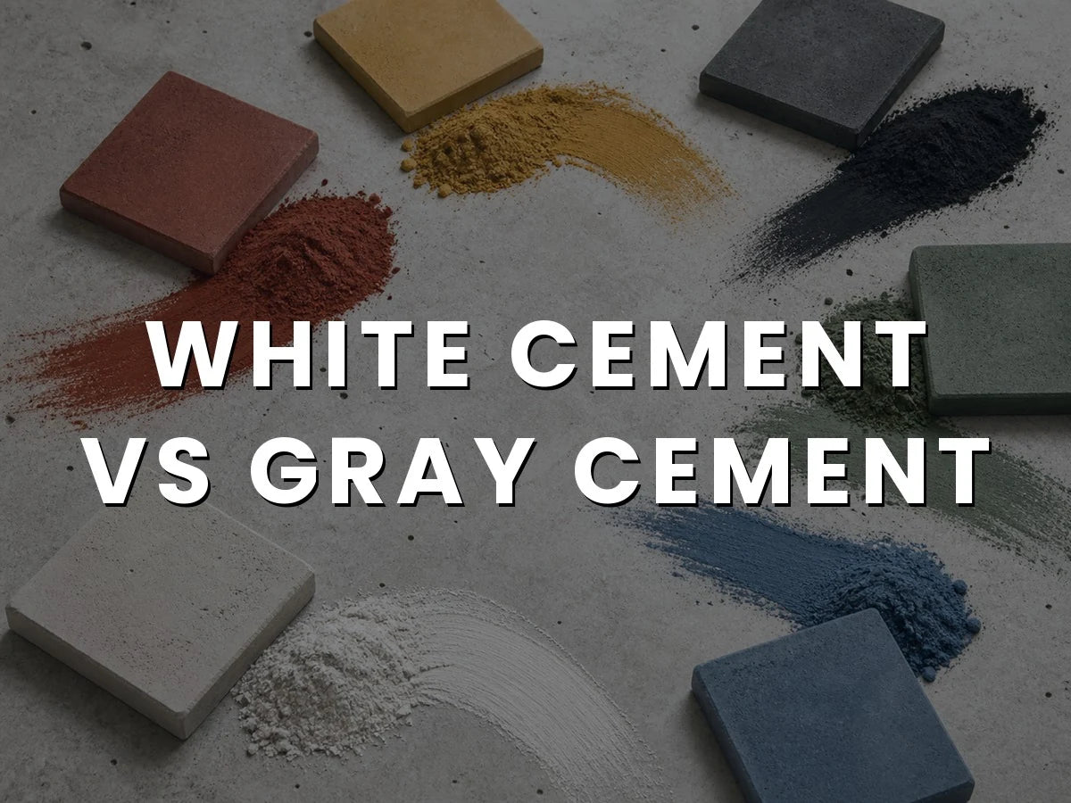 Red, yellow, black, green, white and blue concrete pigment powders swept across a concrete surface beside pavers cast in the matching colors, titled “White Cement vs Gray Cement”
