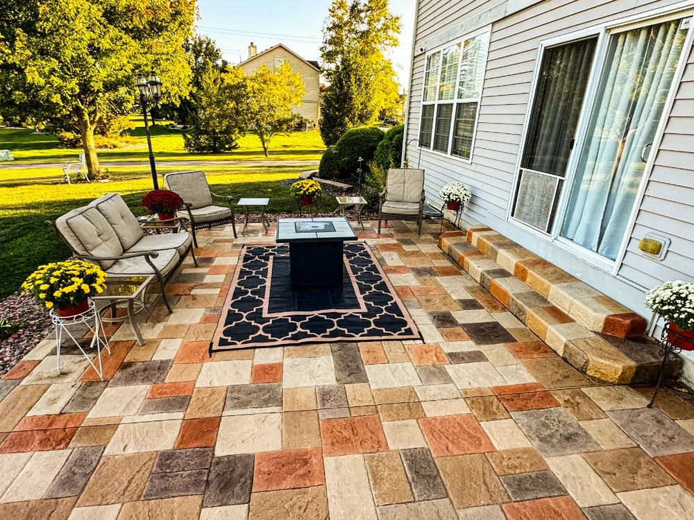 Auburn, Khaki, Terracotta, and Yukon Gold Antiquing Stains on ashlar pattern stamped concrete patio with natural stone look.
