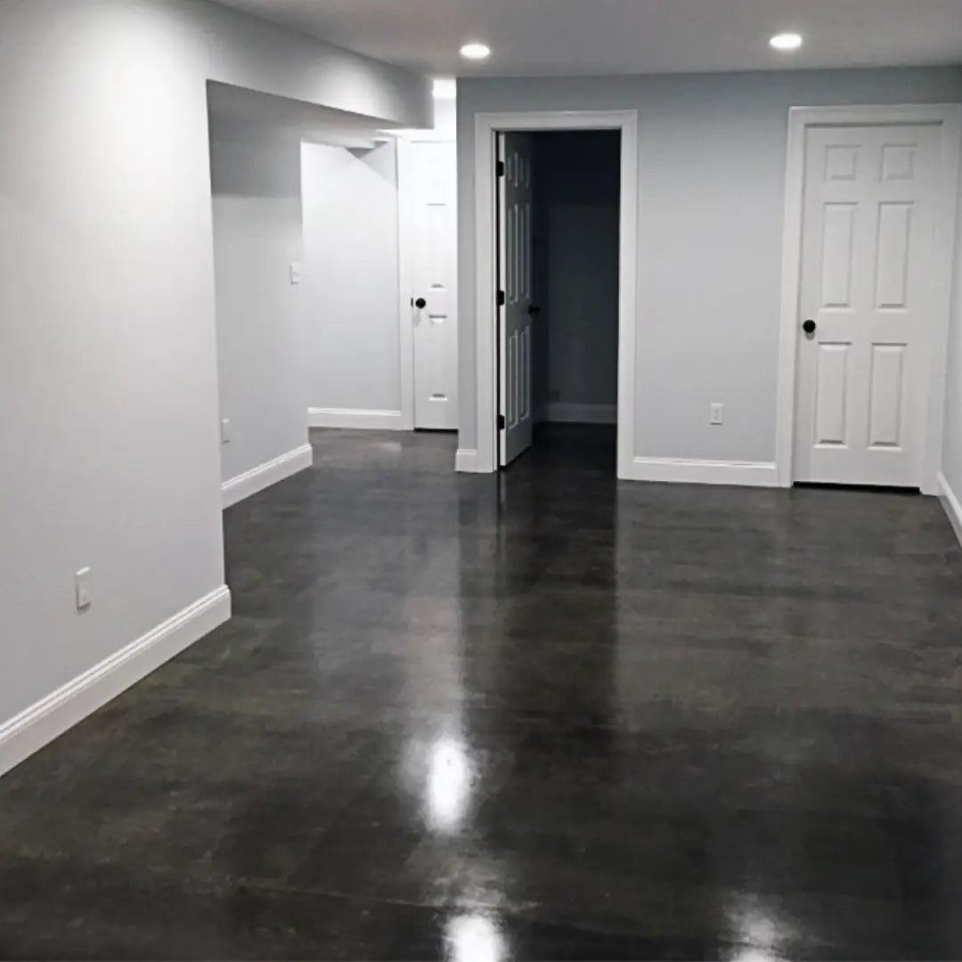Basement with gray concrete floor and white walls