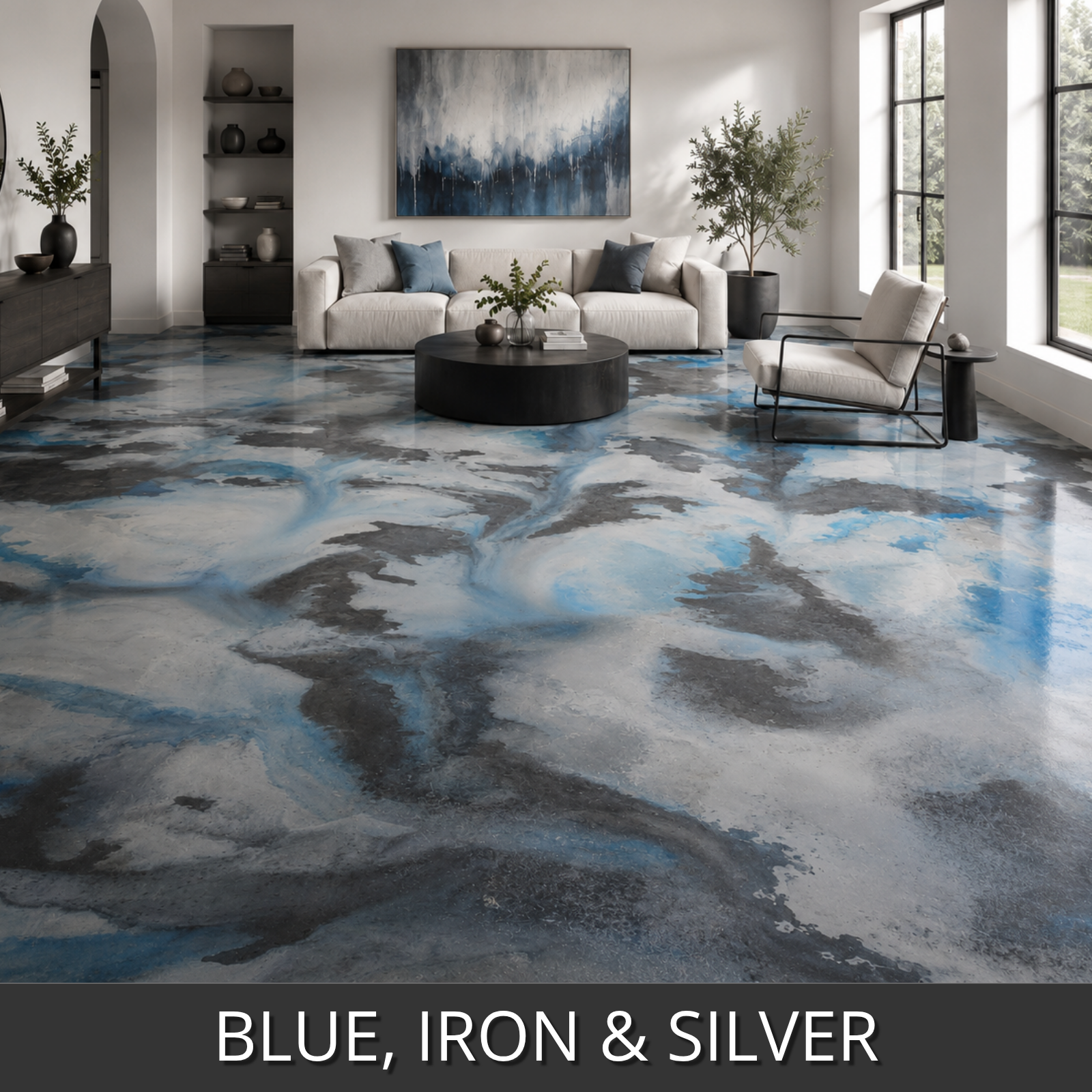 A glossy living room with a dramatic abstract floor finish in swirling blue, iron-gray, and silver colorwave tones. The room includes a white sofa, black coffee table, modern chair, shelving, and large windows.