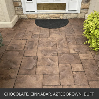 Stamped concrete entry landing at a front door with stone trim, Antiquing™ Stamped Concrete Stain in Chocolate, Cinnabar, Aztec Brown and Buff