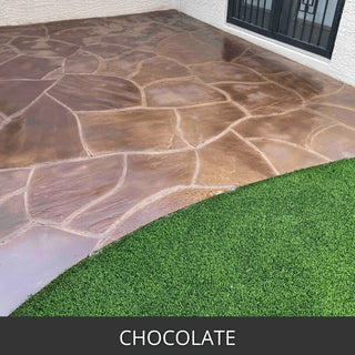 Stamped concrete walkway in a random flagstone pattern beside a lawn, Antiquing™ Stamped Concrete Stain in 407 Chocolate