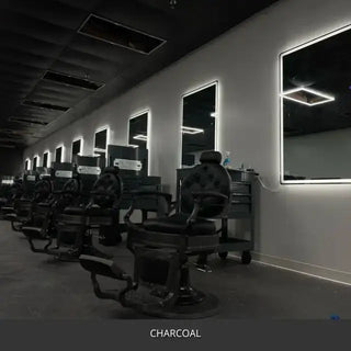Sealed concrete floor in a barber shop with rows of chairs, AcquaTint™ PRO Colored Sealer in 506 Charcoal
