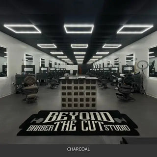 Sealed concrete floor in a barber shop with rows of chairs, AcquaTint™ PRO Colored Sealer in 506 Charcoal