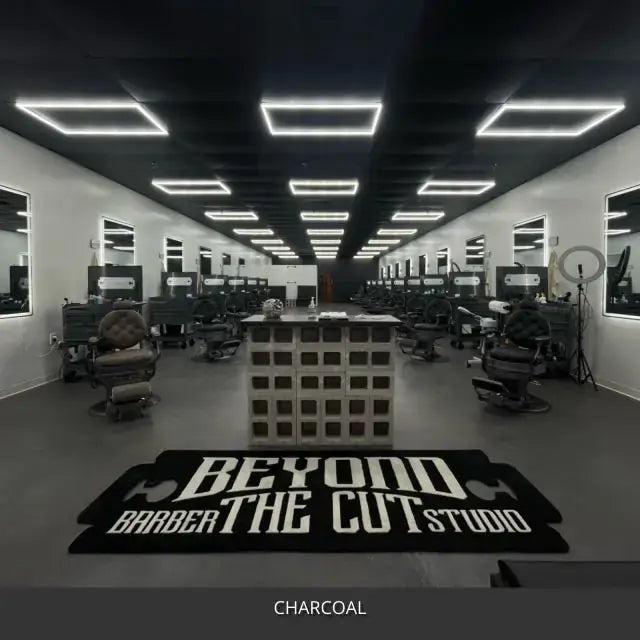 Sealed concrete floor in a barber shop with rows of chairs, AcquaTint™ PRO Colored Sealer in 506 Charcoal