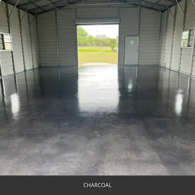 Sealed concrete floor inside a metal building with an open bay door, AcquaTint™ PRO Colored Sealer in 506 Charcoal