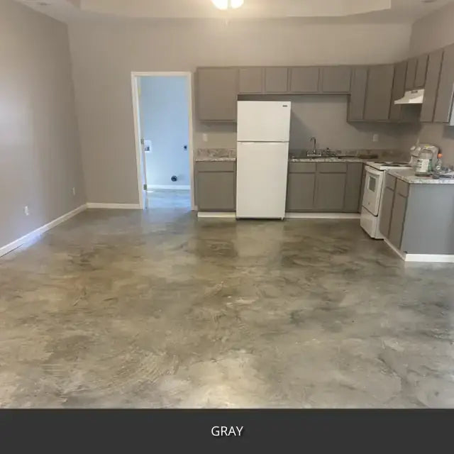Sealed concrete floor in an open kitchen and living space, AcquaTint™ PRO Colored Sealer in 515 Gray