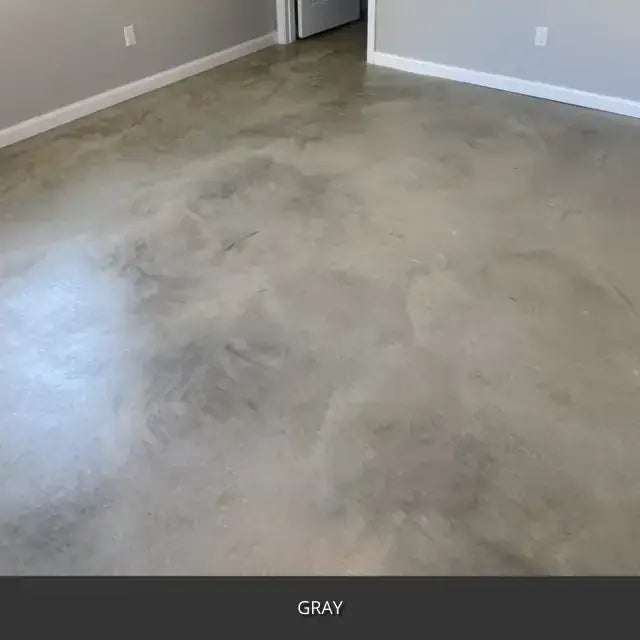 Marbled sealed concrete floor in an empty room, AcquaTint™ PRO Colored Sealer in 515 Gray