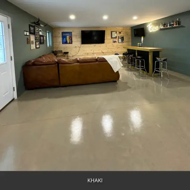 Sealed concrete floor in a basement living room with a bar, AcquaTint™ PRO Colored Sealer in 516 Khaki