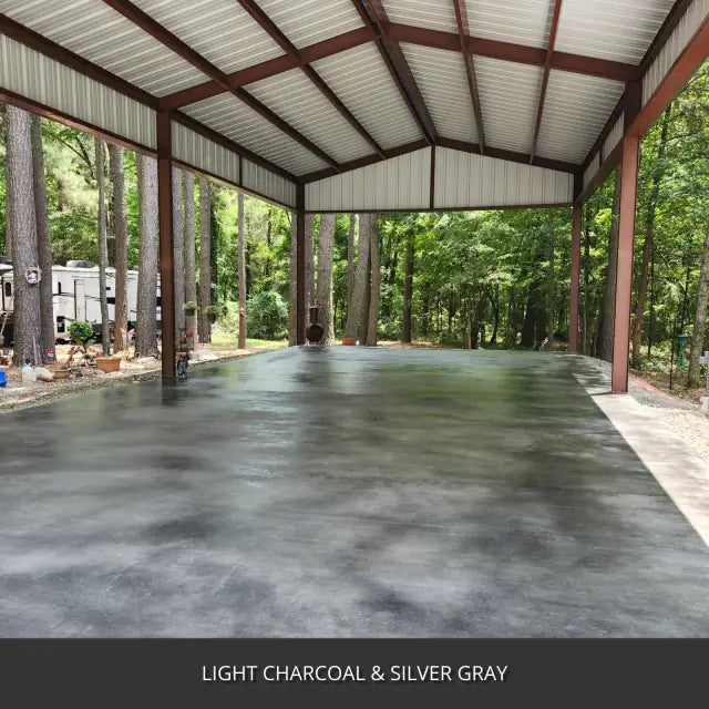 Sealed concrete slab under an open pole barn in the woods, AcquaTint™ PRO Colored Sealer in Light Charcoal and Silver Gray