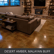 Acid stained concrete floor in a living room with a stone fireplace, EverStain™ Acid Stain in Desert Amber and Malayan Buff