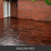 Acid stained concrete patio in a random flagstone pattern along a brick wall, EverStain™ Acid Stain in ENR English Red