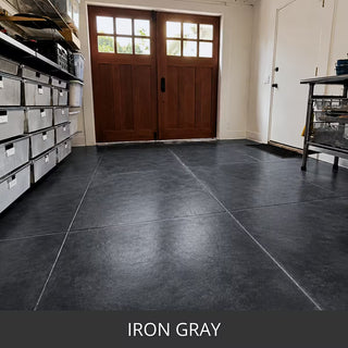 Stained concrete floor in an entry with double wood doors, ColorWave® Stain in 605 Iron Gray