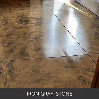 Marbled stained concrete floor with a gloss finish, ColorWave® Stain in Iron Gray and Stone
