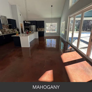 Stained concrete floor in a kitchen with tall windows, ColorWave® Stain in 613 Mahogany