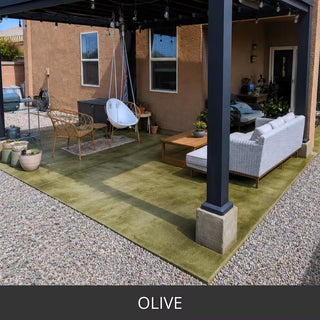 Stained concrete patio under a covered porch with outdoor sofas, ColorWave® Stain in 618 Olive