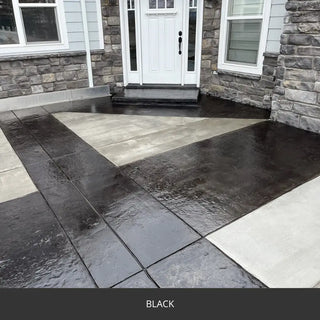 Sealed concrete entry walkway with a contrasting border at a stone house, EasyTint™ Tinted Concrete Sealer in 503 Black