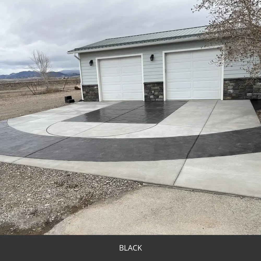 Sealed concrete driveway with a contrasting border at a garage, EasyTint™ Tinted Concrete Sealer in 503 Black