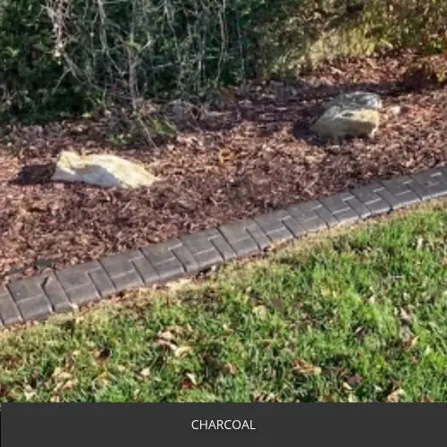 Sealed concrete walkway edge beside a mulch bed, EasyTint™ Tinted Concrete Sealer in 506 Charcoal