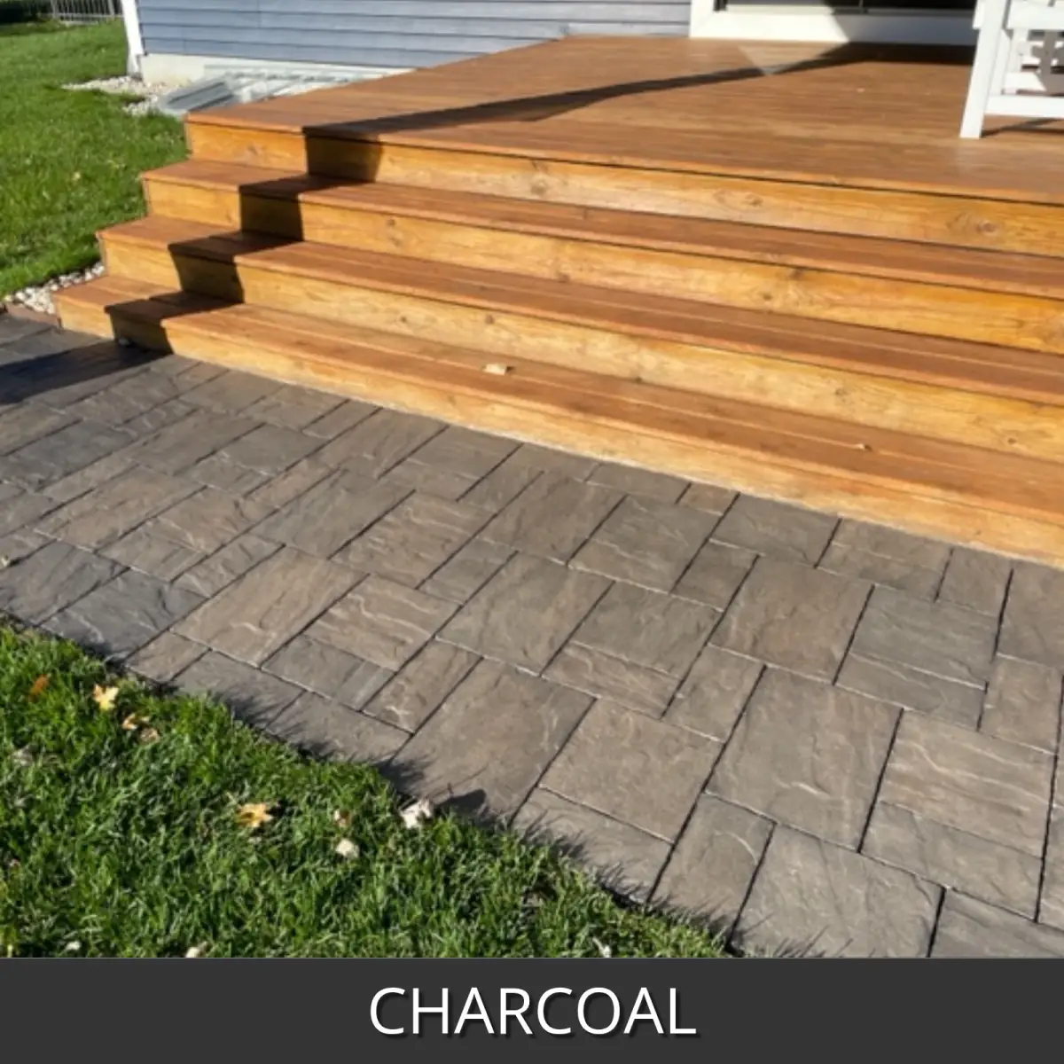 Stamped concrete steps and landing at a wood deck, EasyTint™ Tinted Concrete Sealer in 506 Charcoal