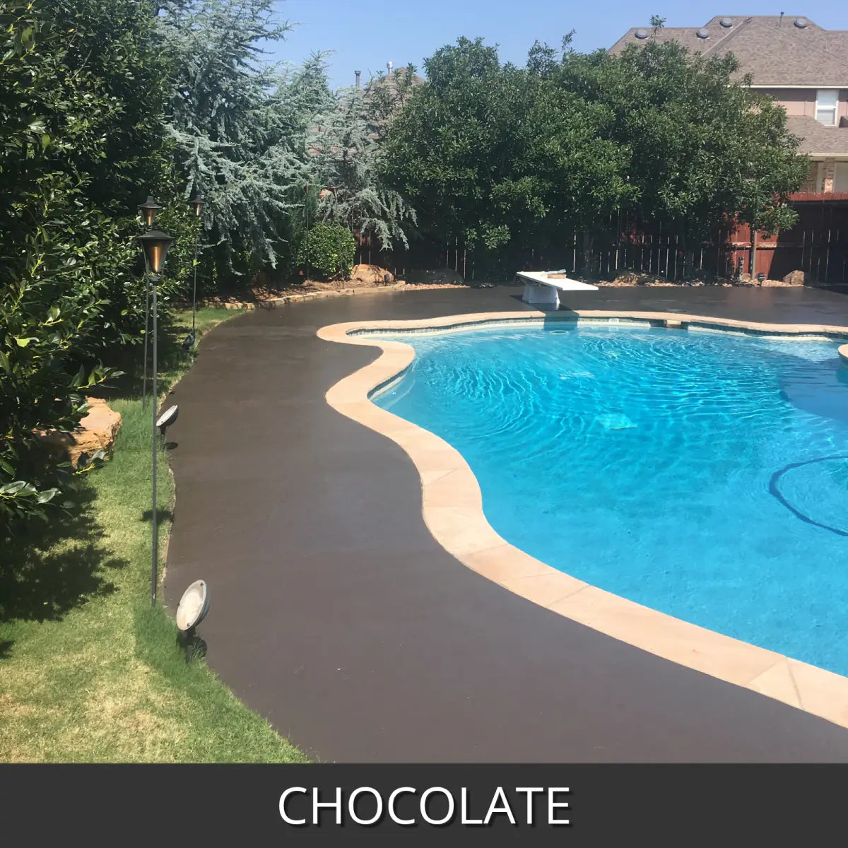 Sealed concrete pool deck around a free form swimming pool, EasyTint™ Tinted Concrete Sealer in 507 Chocolate