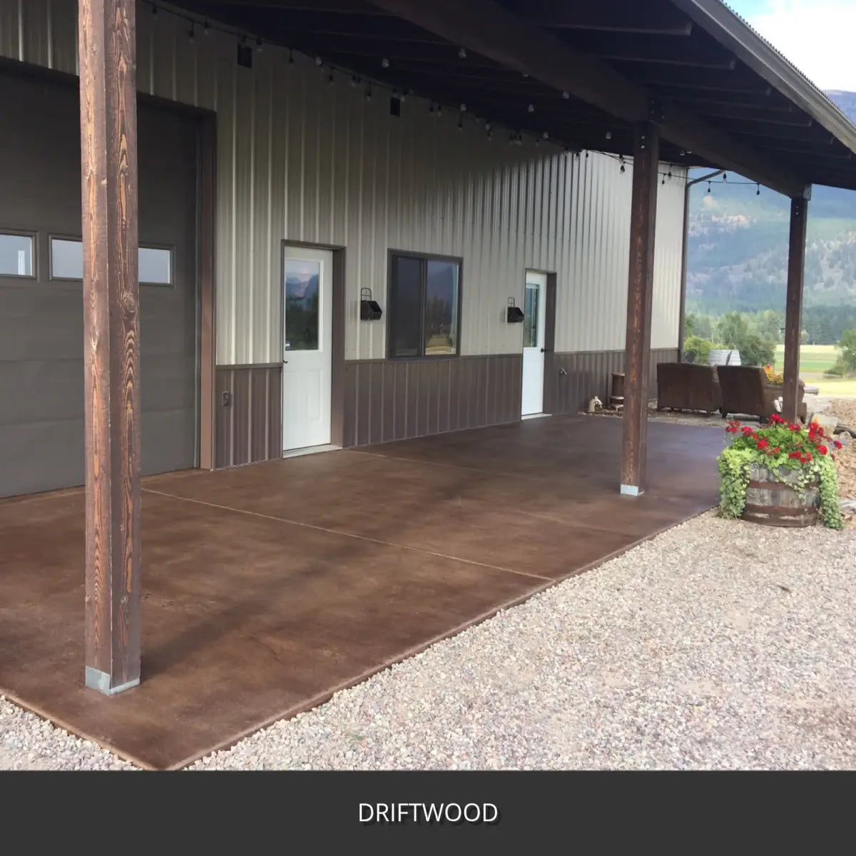 Stamped concrete patio along a metal building with planters, EasyTint™ Tinted Concrete Sealer in 511 Driftwood
