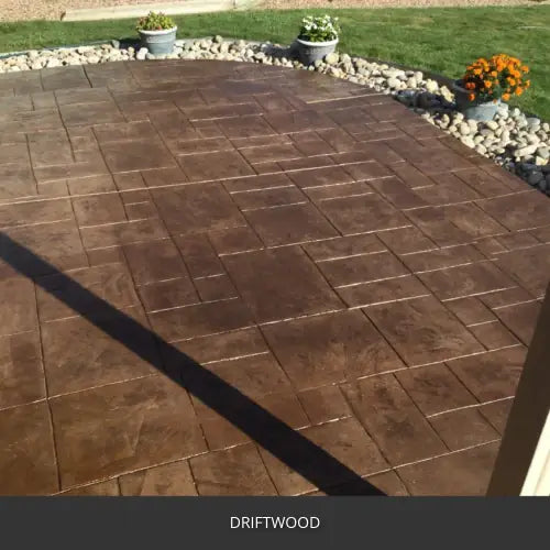 Stamped concrete patio in a tile pattern with a border band, EasyTint™ Tinted Concrete Sealer in 511 Driftwood