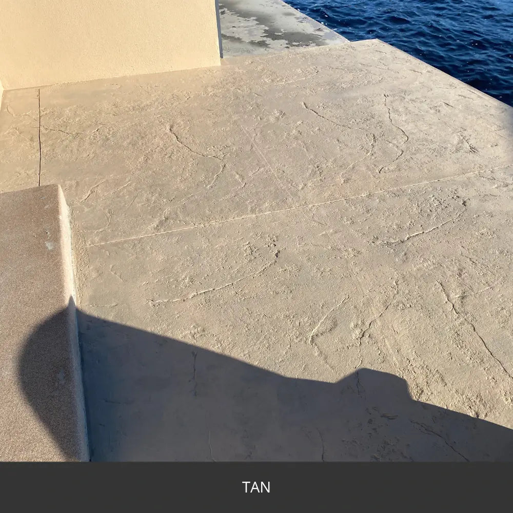 Close view of a stamped concrete pool deck edge, EasyTint™ Tinted Concrete Sealer in 526 Tan