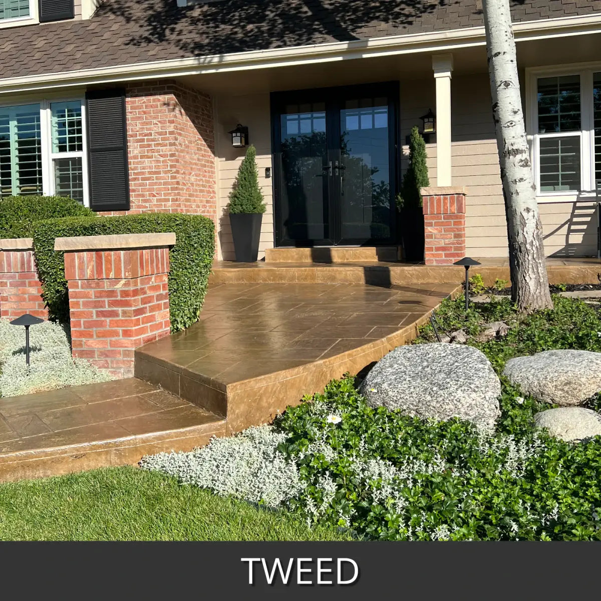 Stamped concrete entry walkway and steps at a brick house, EasyTint™ Tinted Concrete Sealer in 528 Tweed