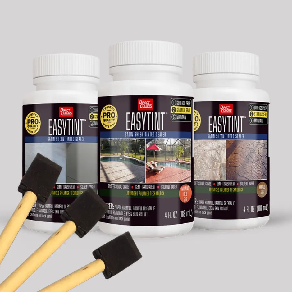 Three bottles of EasyTint paint tinter with applicators on a light gray background