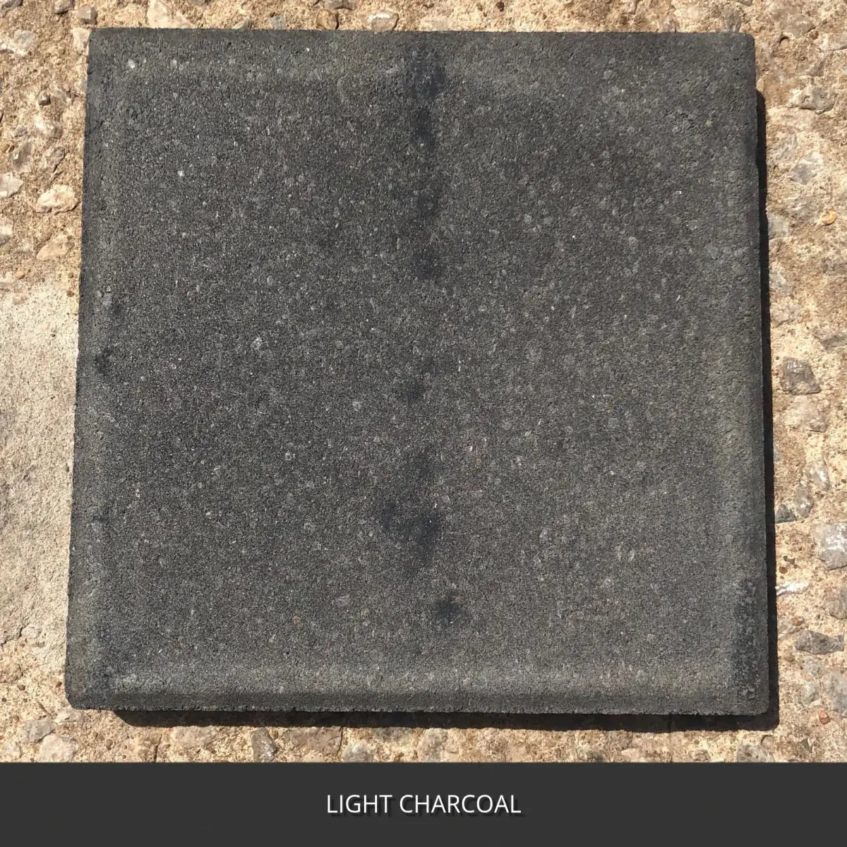 Close view of a stained concrete paver, Portico™ Paver Stain in 717 Light Charcoal