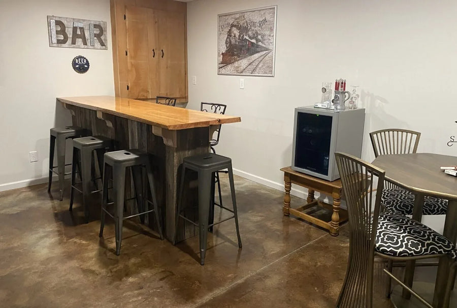This basement bar features EverStain Coffee Brown and Desert Amber acid-stained floors, offering a rich, leather-like finish that complements the rustic décor