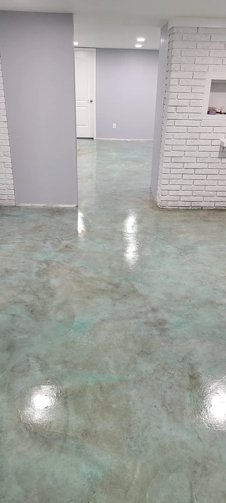 Stained concrete basement floor with Azure Blue EverStain acid stain