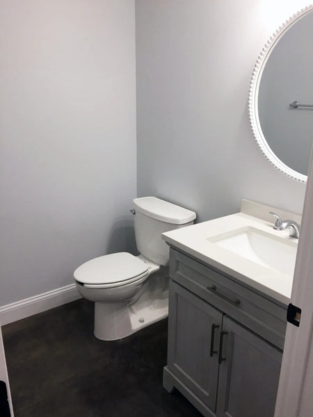 The same bathroom after applying Charcoal AcquaTint™, exhibiting a sophisticated and polished look