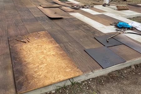 Adding Charcoal and Black Antiquing stain grain highlights over a Coffee Brown Vibrance dye base on stamped concrete