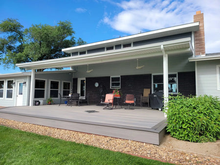 Complete view of a home's stained facade