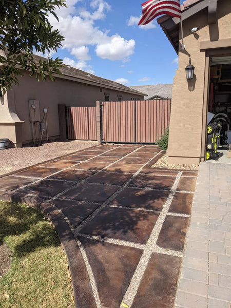 The finished driveway, showcasing the blend of Malayan Buff and Coffee Brown stains, sealed and dried
