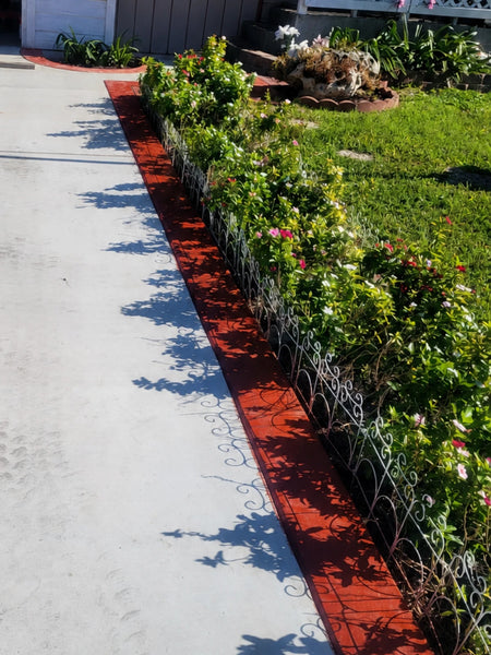 new concrete driveway with Crimson EasyTint stained border
