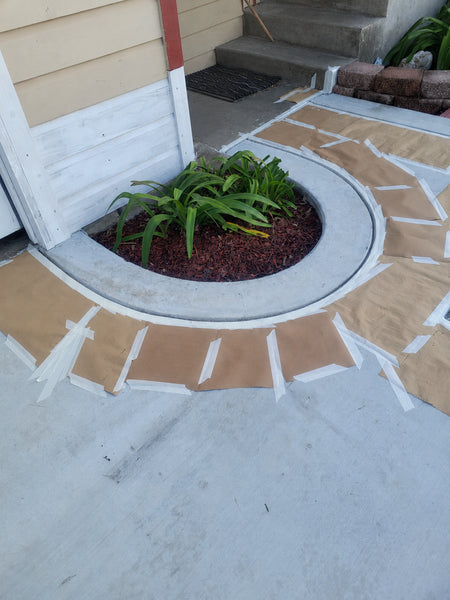 driveway edge taped off before Crimson EasyTint border