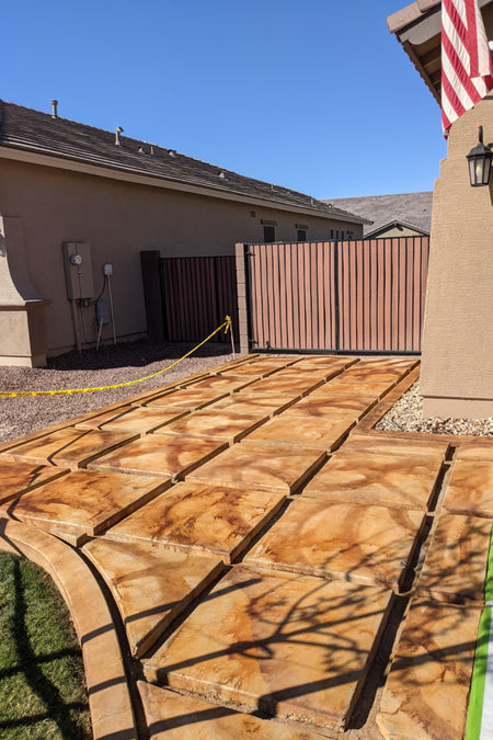 Initial staining of the driveway with Malayan Buff EverStain