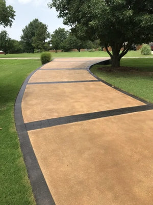 Concrete driveway stained with Yukon Gold Antiquing Stain and Black EasyTint