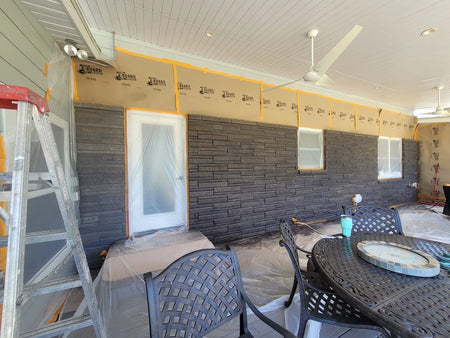 During the staining process of a home facade