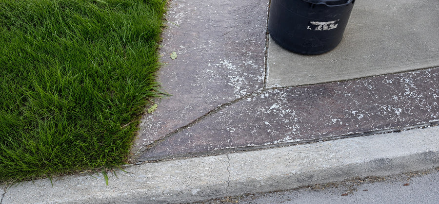 Close-up of stained concrete surface texture before sealing