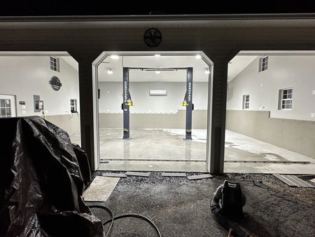 New concrete garage floor prepped for dye application