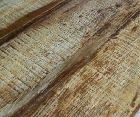 Concrete countertop cast, sand-blasted, and acid stained to look like wood grain