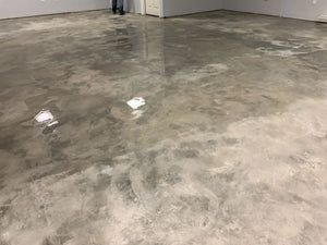 Allow concrete floor to dry before colored concrete sealer application