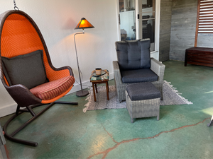 Finished sunroom floor showing azure blue stain sealer and acrylic paint veining accents